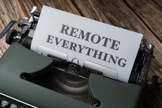 Old-fashioned typewriter with a paper showing the words 'Remote Everything', symbolizing remote work and virtual connectivity.